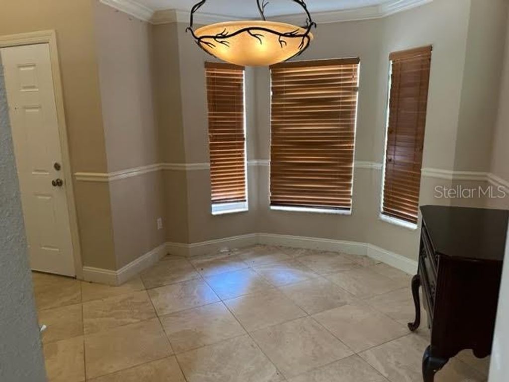 Photo of 12648 Sophiamarie Loop, Orlando, FL 32828 (MLS # O6376154)