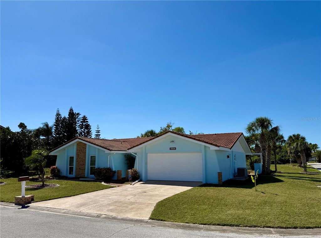 Photo of 9801 San Moreno Way, Port Richey, FL 34668 (MLS # W7879997)
