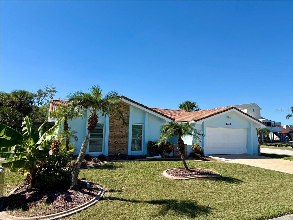 Photo of 9801 San Moreno Way, Port Richey, FL 34668 (MLS # W7879997)