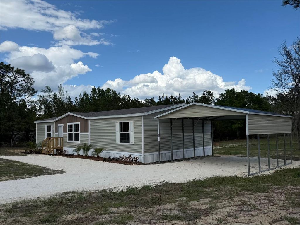 Photo of 11631 NE 105th Avenue, Archer, FL 32618 (MLS # GC539181)