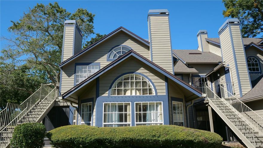 Welcome to this well-maintained first-floor condo located in the heart of Lake Mary. This spacious 2-bed, 2-bath home features an open layout with vaulted wood ceilings, a brick fireplace, and abundant natural light from the large windows and French doors. The kitchen offers granite countertops, stainless steel appliances, and attractive raised-panel cabinetry with excellent storage, all opening seamlessly to the main living area. Both bedrooms offer high-quality custom closet doors, with the primary suite featuring custom built-in storage designed to maximize organization and space. The primary bathroom includes a granite vanity and a fully tiled walk-in shower, while the second bathroom offers a granite vanity and a tiled shower/tub combo. The in-unit laundry area is equipped with a convenient washer/dryer combo machine. Step out to the private screened-in porch—ideal for relaxing or adding versatile outdoor living space—accessible through double French doors. The home is located toward the front of the community and sits just a short distance from the community pool and mailbox area. With a functional layout, thoughtful details, and a highly convenient location close to shopping, dining, parks, and major roadways, this condo offers comfort, style, and move-in-ready appeal.