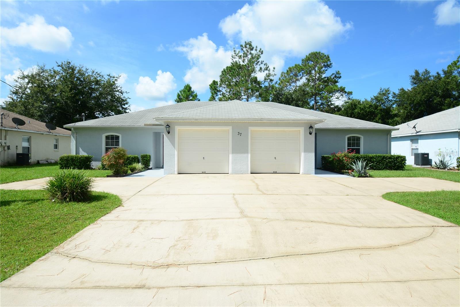 Duplex!! A. Just over 1200 sq ft. Perfect for a couple or small family. 3 bed, 2 bath. All bedrooms are spacious. Tile and carpet flooring. Lovely kitchen, loaded with plenty of cabinets and counter space. Great location!! Nearby: walking and biking paths, Cypress Knoll Golf and Country Club, shopping, dining, convenience of I-95 and just minutes to the beach!