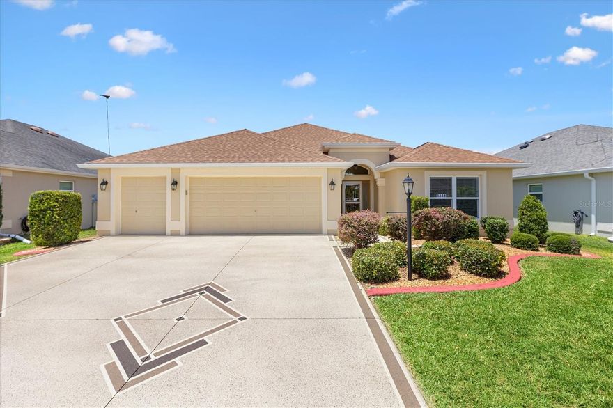 This rare 3 Bedroom, 3 Bathroom Mossy Oak Designer Home in the highly sought after Village of Osceola Hills in The Villages, Florida offers a hard to find combination of three true ensuite bedrooms, turnkey furnishings, immediate availability, and an exceptional central location in one of the community’s most desirable areas.

Better than new and thoughtfully upgraded throughout, this home delivers both comfort and flexibility for full time living, seasonal use, or hosting guests with privacy.

Step inside to a spacious open foyer with designer details that leads into a open concept living area. The kitchen flows seamlessly into the dining and living spaces, creating a natural gathering space for entertaining or everyday living.

The kitchen features a wrap around breakfast bar with seating, soft close cabinetry, pull out shelving, and abundant workspace. The dining area comfortably accommodates a larger dining table, while the living room offers flexible furniture placement.

Upgraded lighting and strategically placed pocket doors enhance both style and privacy throughout the home.

One of the most unique features of this home is the rare three en suite bedroom layout, offering exceptional flexibility for guests and multi purpose living.

Guest Bedroom One is fully furnished and move in ready for visitors. Guest Bedroom Two offers a versatile setup with a pull out sofa, office configuration, and large walk in closet, making it ideal as a combined guest room and workspace.

The first guest bathroom includes a ceramic tiled tub and shower combination with glass block transom windows, providing privacy and natural light. The second guest ensuite features a glass enclosed tiled walk in shower with built in bench.

Privately located beyond the main living area, the primary suite features tray ceilings and generous space for a full king bedroom set. The primary bathroom offers dual vanities, a zero entry Roman shower, and a massive walk in closet.

The home also includes a large designated laundry room with utility sink, lower cabinetry, upper shelving, and a like new LG washer and dryer set.

The garage setup is equally impressive with a two car garage plus golf cart garage and luxury epoxy coated flooring completed in 2025, providing excellent space for vehicles, storage, or projects.

Additional upgrades and improvements include:

Exterior block and stucco painted in 2024
Hurricane grade storm door
Whole house water softening system

Located in the Village of Osceola Hills, this home offers convenient access to some of the newest and most popular amenities in The Villages.

Osceola Hills Recreation Center is approximately 0.2 miles away and includes an adult pool, bocce, and shuffleboard courts. The home is also just minutes from Trailwinds Village, featuring shopping, dining, and conveniences including Target, Lowe’s, Publix, and more.

Living in The Villages, Florida means enjoying access to championship and executive golf courses, recreation centers, pools, clubs, nightly entertainment, and miles of golf cart paths connecting the community.

With its rare three en suite layout, turnkey offering, golf cart garage, and premier Osceola Hills location, this Mossy Oak presents a truly exceptional opportunity in one of Florida’s most sought after active adult communities. Exceptionally maintained.