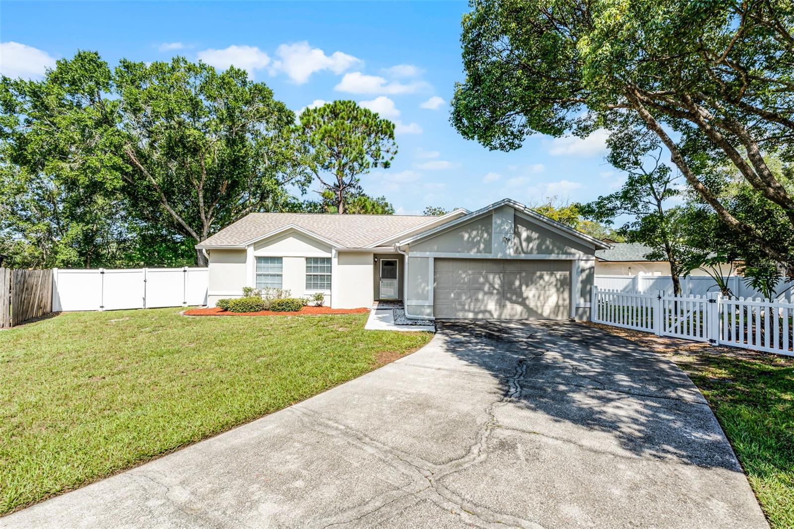 ORLANDO 4-BEDROOM GEM - Welcome home to this beautifully updated 4-bedroom, 2-bath charmer in the highly desirable Valencia Grove community. From the moment you step inside, you’ll be greeted by an inviting open-concept living and dining area filled with natural light, perfect for both relaxing evenings and lively gatherings. The heart of the home is the kitchen, thoughtfully refreshed with modern finishes and plenty of space for cooking and entertaining. Fresh paint inside and out gives the home a crisp, move-in-ready feel—plus, the exterior paint is ingrained into the stucco for lasting beauty and durability. With a smart split-bedroom layout, privacy is built right in. Step outside and discover the oversized backyard, fully enclosed with low-maintenance vinyl fencing, and a 9X8 electrified shed with workshop. It’s the perfect canvas for creating your own outdoor retreat—whether that means a garden, a play area, or a space for weekend barbecues and family fun. The location couldn’t be better. You’ll be just minutes from UCF and enjoy quick access to SR 417, making commuting simple. Best of all, the home is zoned for Winter Park High School. This home truly checks all the boxes: modern updates, a spacious layout, a fantastic community, and an unbeatable location. Schedule your showing today!