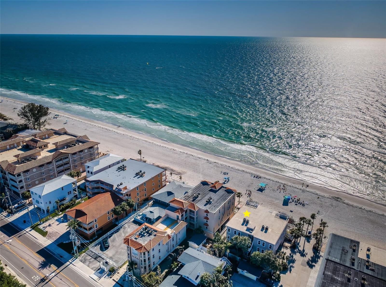 ..Gulf-front, small 2 story private complex of just 4 units - Built 2003.. Completely Remodeled - Three Bedrooms / Two baths with 1,520 square feet. Includes a 15 x 28.4 Great room. Turnkey, capable of fully furnished . Top floor - southwest corner unit - private rooftop terrace with long-range gulf views, remodeled with impact glass, impact sliders, new plank tile flooring, new kitchen, new baths, new wall finish, oodles of closet space, professionally decorated plus a large poolside 4-by-10-foot storage / cabana/ cage. Ideal for beach chairs, boogie boards and bicycles. Your private beach home comes with a one-year minimum rental policy that does not allow short-term rentals so you know your fellow neighbors. The Sundowner complex has a heated gulf-front spillover spa and pool for owners and their guests to enjoy. 7th Avenue has no public parking west of Gulf Boulevard, no crowds here and 25 restaurants within 1/2 mile in either direction. Residence #201 conveys with two under-building garage spots, secured elevator - you need key to call from garage landing. Spacious corner unit with plenty of natural light, an open floor plan (15-by-28.4 Great room), enjoying impressive long-range gulf and beach views. Your gulf-front balcony has private access to your rooftop terrace. Primary Bedroom suite on the gulf side - completely remodeled main bath, walk-in shower with bench and multiple shower heads, two linen closets plus a large separate 4.10-by-10 foot walk-in closet. Your beach retreat awaits. Unit is set up as a smart home - allowing Owners to control thermostats, lights, and other devices remotely or voice activated. The Sundowner is a well-maintained four-unit building with a privately run association and monthly maintenance of $980. Enjoy the photos, floor plans and walk-through tour. Unit shows great.. NOTE: No Milestone report required here... Milestone Laws were put in place to ensure buildings at least 3 stories or taller & 25 years old were given a new structural engineers report . Taller & heavier Buildings carry more weight bearing down on structural support systems.. One and Two Story Buildings don't pose this problem due to the limited height & weight of the structure. There are other factors as well but height & downward weight are prominent - Hence no milestone report.. Call for details..