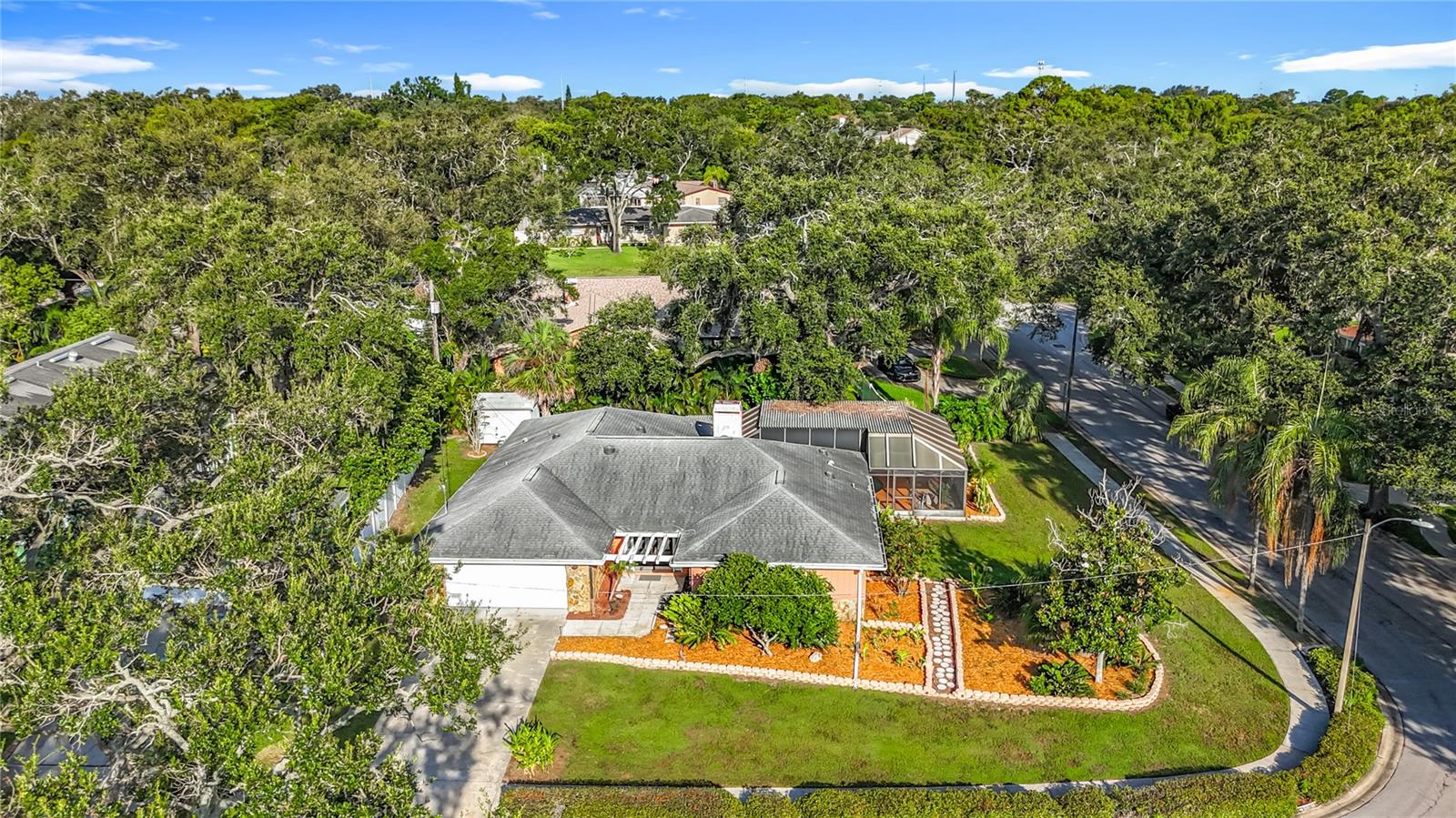 Charming Clearwater Pool Home – Prime Location & Endless Possibilities!
Welcome to 950 College Hill Drive, a well-maintained 3-bedroom, 2-bathroom home located in one of
Clearwater’s most established and desirable neighborhoods in the 33765 zip code. This inviting residence
features a screen-enclosed pool, wood-burning fireplace, and an attached two-car garage, offering a
rare combination of space, character, and potential. Step inside to discover a bright, open-concept living and dining area, freshly painted in neutral tones, complemented by easy-care tile flooring throughout. The kitchen provides a functional layout with ample
cabinet space, ready for your personal updates and style. The primary suite includes a private en-suite bathroom, while two additional bedrooms provide flexibility for guests, a home office, or a growing family. French doors open to the expansive screened pool area,
creating the perfect setting for outdoor dining, lounging, or weekend fun in the Florida sunshine. An oversized driveway ensures plenty of parking for multiple vehicles, recreational toys, or a boat. With no HOA restrictions, you’ll have the freedom to customize and improve the property to suit your needs. Located just minutes from Clearwater Beach, shopping, dining, parks, top-rated schools, and major
commuter routes, this home offers unbeatable convenience in a quiet, residential setting. Don’t miss your chance to own a pool home in the heart of Clearwater! Schedule your private showing today and envision the lifestyle that awaits at 950 College Hill Drive.