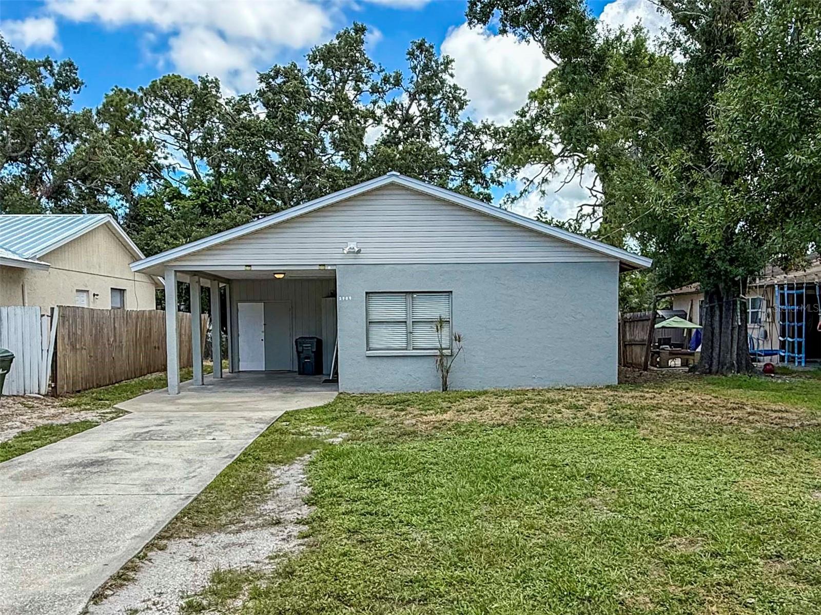 This is a 2 bedroom 2 bath home in the Arlington Park Neighborhood! This home features an open split floorplan with tile in the master suite and terrazo flooring everywhere else and 2 master suites! The eat-in kitchen features a breakfast bar, granite countertops, a stainless steel refrigerator, a glass stovetop and a microwave with convection oven. The master bedroom features an ensuite bathroom with a walk-in shower. There is a spare bedroom also has an ensuite bathroom with a walk-in shower. The home also has a 1 car carport and a large backyard. The home is conveniently located in the desirable Arlington Park neighborhood, just minutes from downtown Sarasota, Sarasota Memorial Hospital, and an array of restaurants and shopping destinations. Plus, you're just a short drive away from the pristine shores of Lido Beach or the world-renowned Siesta Key Beach. We score every application. If an application doesn’t score high enough, the resident may be required to place the equivalent of two months’ rent in a security deposit. Please be aware that leasing this property includes a non-optional Home Assistant Services Package that will cost an additional $30 per month. These services and their cost are separate from Tenant’s monthly rent payment and all other payments described in the Lease or any separate Lease addendums. The Home Assistant Services offered are described in the Resident Welcome Packet which can be viewed here: www.sarasotamanagement.com/home-assistant/