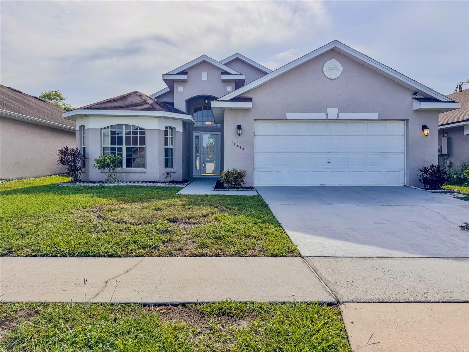Welcome to this spacious 4-bedroom, 2-bath single-family home in the desirable Southchase community. This well-maintained property offers comfortable living with lawn care included, giving you more time to relax and enjoy. The primary suite features a private bathroom with dual sinks, a garden tub, and a separate shower for added convenience. Step outside to a backyard with a privacy fence and a screened-in lanai, perfect for enjoying the outdoors year-round. A washer and dryer are included for your convenience. Perfectly situated near major highways, this home offers quick access to Orlando International Airport (MCO), world-famous theme parks, as well as a variety of restaurants and shopping destinations. Whether you’re commuting for work or enjoying all that Central Florida has, this location can’t be beat.