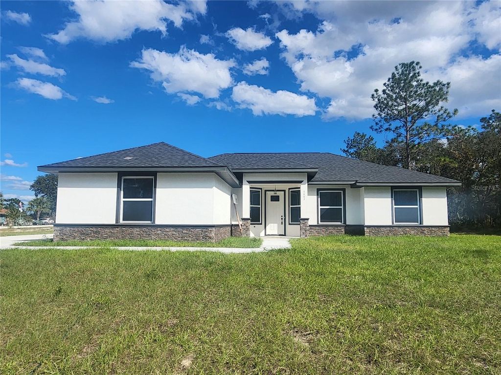 Photo of 9483 SW 121st Terrace, Dunnellon, FL 34432 (MLS # OM711902)