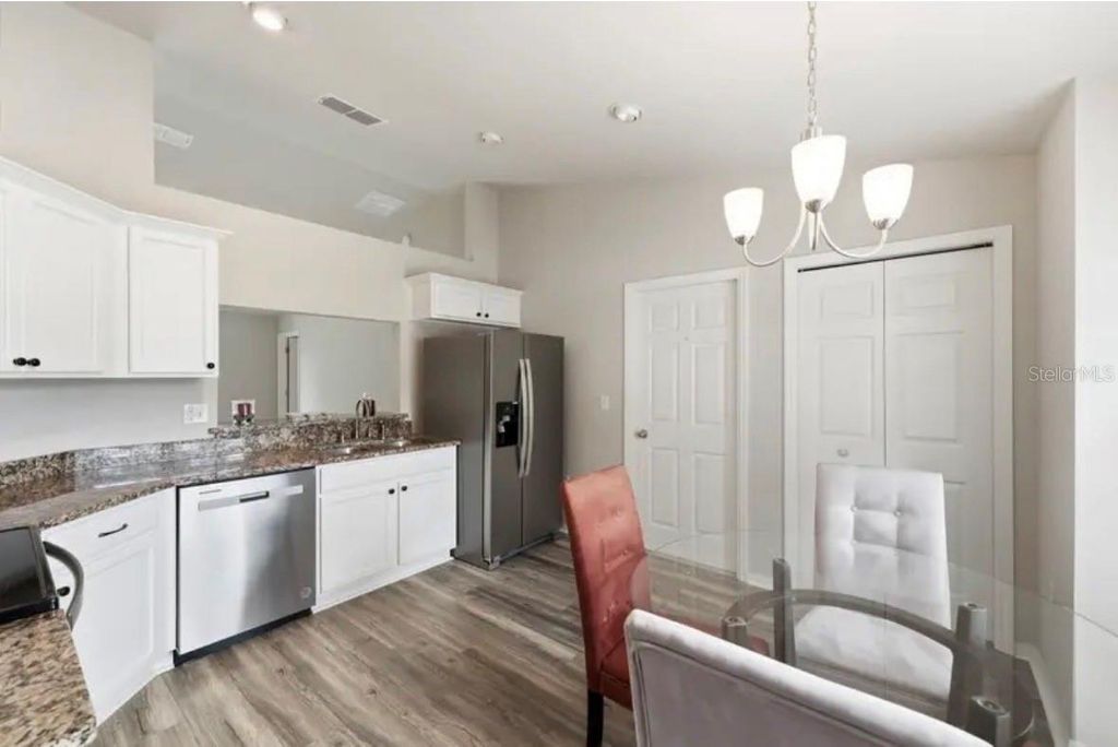 Photo of 202 Highland Meadows Place, Davenport, FL 33837 (MLS # O6412237)