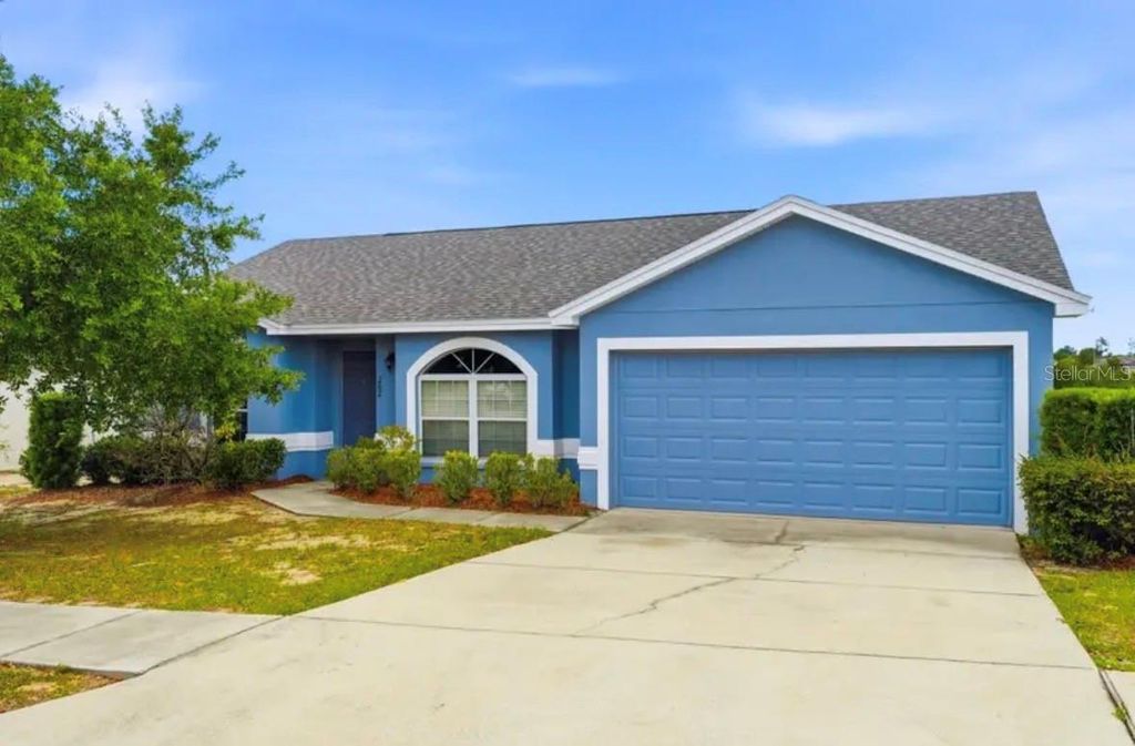 Photo of 202 Highland Meadows Place, Davenport, FL 33837 (MLS # O6412237)