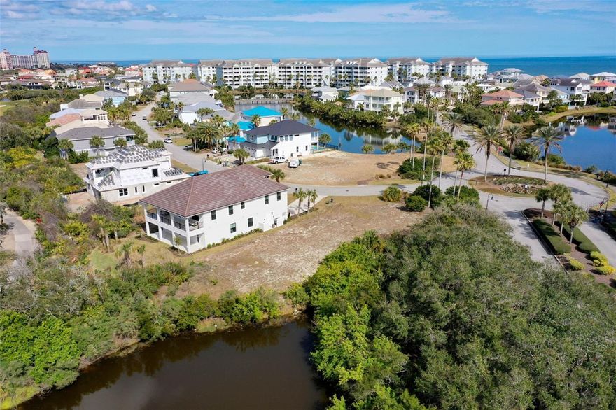 This is the one you’ve been waiting for- seize the opportunity to build your dream home on one of the only corner lots in all of Cinnamon Beach at Ocean Hammock! Over 180 feet deep at its deepest point, this oversized home site is one of the largest in the community, and offers a world of possibilities for your creative home design. Featuring water views in practically every direction, your new home will be an oasis unlike any other in the neighborhood. Take advantage of not having a neighbor to the East, West or South, inviting a floor plan with lots of windows and ample natural light. Kick your feet up on your rear balcony and watch the golfers at play on the famous Jack Nicklaus Signature Ocean Course. Just 400 yards to the sand! Enjoy morning walks on the beach and quiet nights under the stars. No timeline to build. HOA handles all the lot maintenance, including mowing, irrigation and landscaping. Your days of yard work are over! Short walk to the fantastic Cinnamon Beach community amenities, including oceanfront pool and hot tub complex, lakeside pool with kids’ water park, clubhouse lounge, game room, fitness center and more. Scenic gated community with amazing short-term rental opportunities, if desired. Don’t delay!