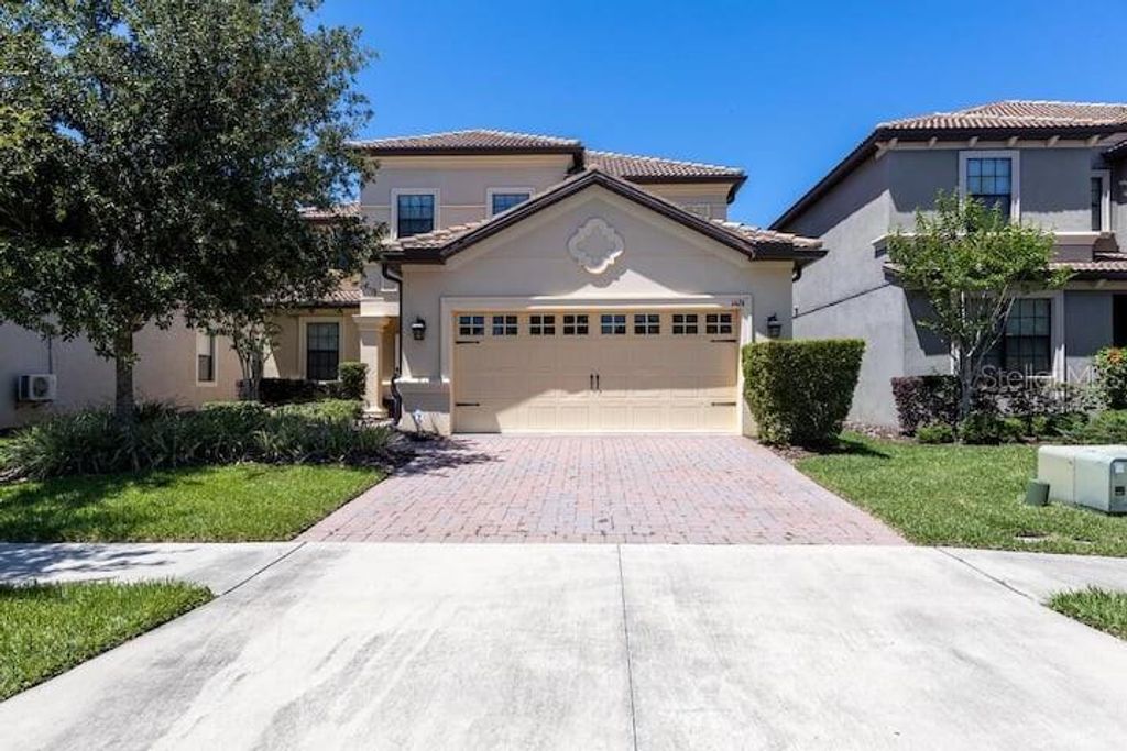 Photo of 1424 Moon Valley Drive, Davenport, FL 33896 (MLS # O6349433)