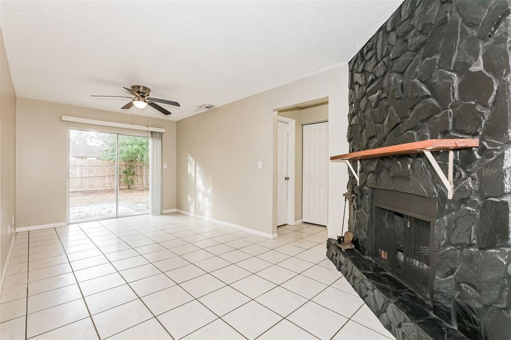 Photo of 5015 E 111th Avenue, Tampa, FL 33617 (MLS # O6371070)