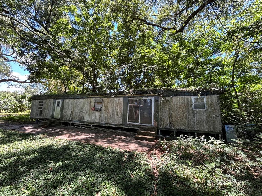 Photo of 3610 NE 59th Avenue, Silver Springs, FL 34488 (MLS # OM724056)