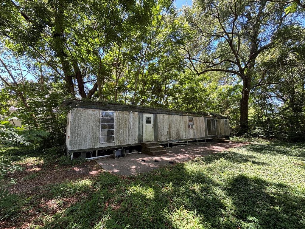 Photo of 3610 NE 59th Avenue, Silver Springs, FL 34488 (MLS # OM724056)