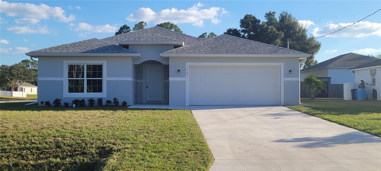 Available immediately, this stunning new construction home in North Port offers modern living at its finest. Boasting 4 bedrooms, 2 bathrooms, and nearly 1,800 sq ft of open-concept space, this residence is designed for comfort and style.
Spacious kitchen with oversized island—ideal for entertaining, Split floor plan for privacy and functionality, Situated on a generous 11,000+ sq ft corner lot, Convenient laundry closet and attached two-car garage, Prime location near I-75, schools, shopping, and dining. Whether you're a growing family or looking for a fresh start in Florida’s fastest-growing city, this home checks all the boxes. enjoy the freedom to personalize your space and lifestyle
