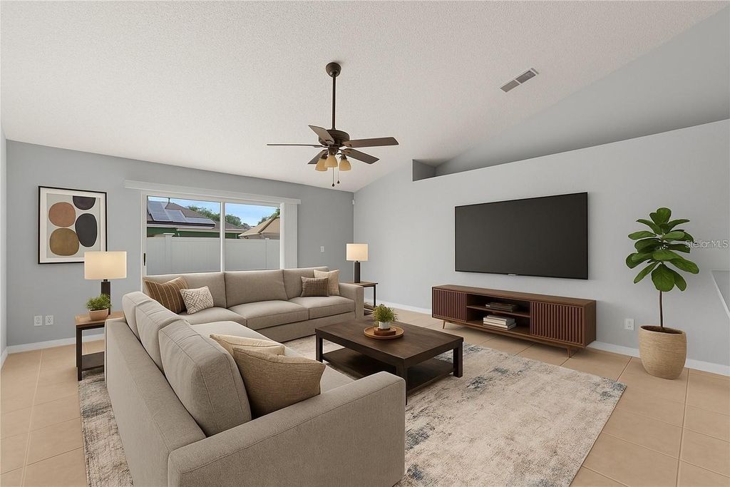 Photo of 408 Magpie Court, Kissimmee, FL 34759 (MLS # O6385317)