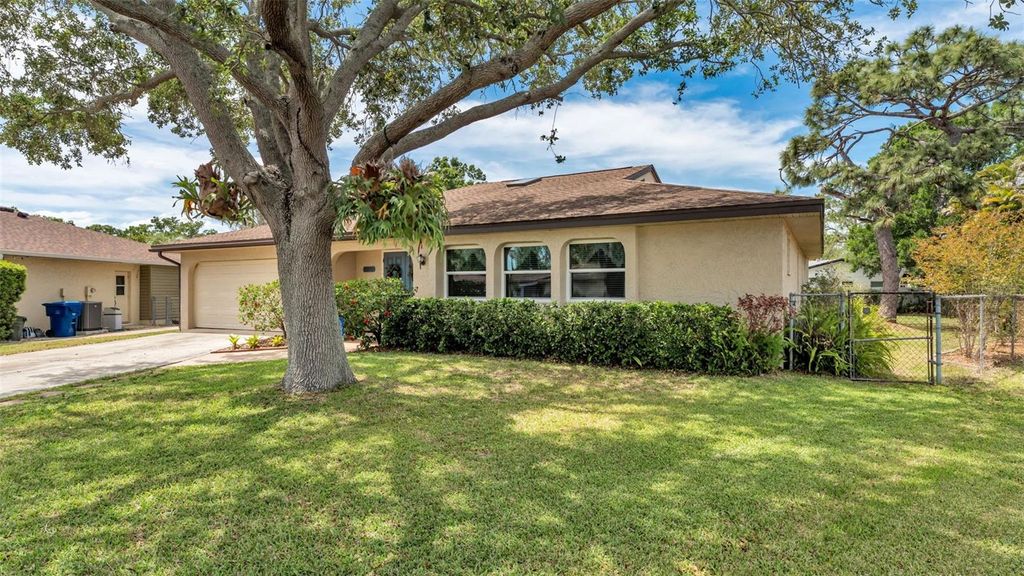 Photo of 2974 163rd Terrace N, Clearwater, FL 33760 (MLS # L4961104)