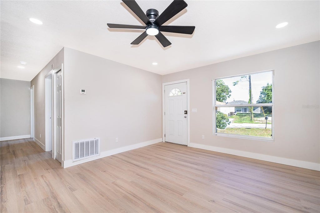 Photo of 1033 Embrun Court, Kissimmee, FL 34759 (MLS # O6428635)