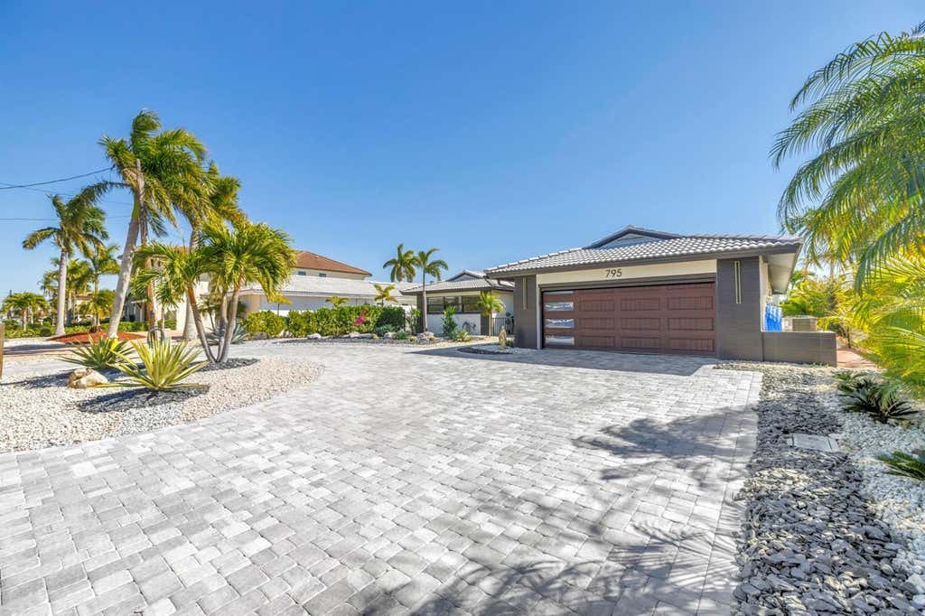 Photo of 795 Capri Boulevard, Treasure Island, FL 33706 (MLS # TB8514800)