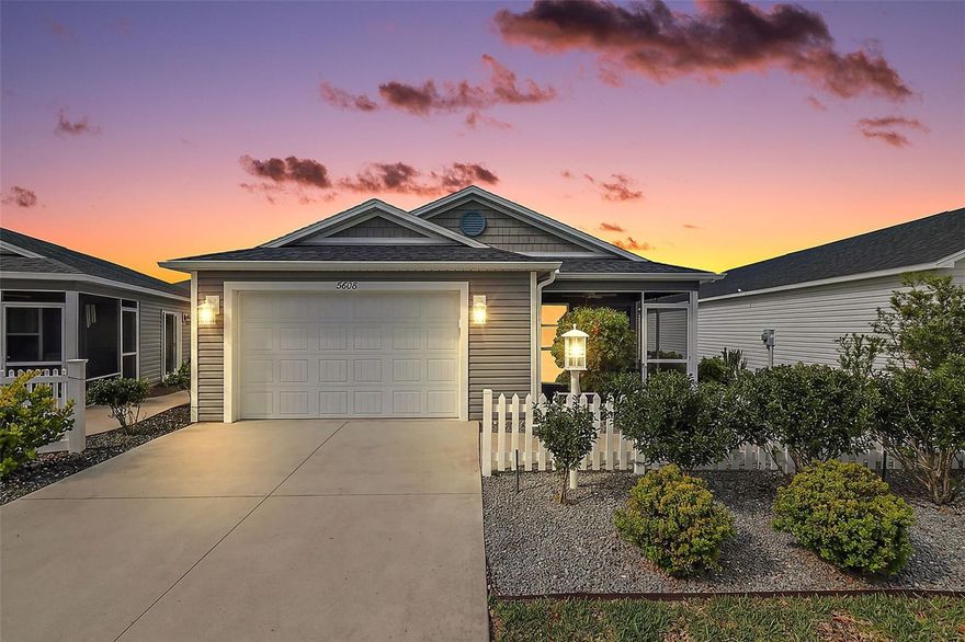 One or more photo(s) has been virtually staged. Enjoy the ease of Florida living in this GORGEOUS, METICULOUSLY-MAINTAINED 2/2 Ruby Patio Villa featuring an INTERIOR LAUNDRY and SPACIOUS FRONT and SIDE PATIOS with REAR PRIVACY FENCING - conveniently located in the Gracie Villas of the contemporary Village of Bradford - JUST MINUTES to Sawgrass Grove and the NEW Eastport Town Square with live nightly entertainment - and CR 44 with an abundance of shopping, dining, and more! As you arrive, this BEAUTIFUL home immediately captures your attention with its inviting white picket fence, LOW-MAINTENANCE STONE landscaping, and EXPANSIVE front and side patios—perfect for soaking up the Florida sunshine or hosting memorable gatherings with family and friends! From the patio, step into the screened lanai, complete with a ceiling fan and PAINTED floor, offering a serene space to unwind with your morning coffee, evening drink, or your favorite book. Enter into the OPEN CONCEPT layout of the living, dining, and kitchen boasting HIGH VAULTED ceilings and RICH, WOOD-GRAIN LUXURY VINYL PLANK flooring. The SPACIOUS main living area offers a set of sliding glass doors to the side patio and two LARGE windows, for ABUNDANT NATURAL LIGHT. The kitchen is a chef’s delight showcasing CHARCOAL SHAKER cabinetry with PULL-OUTS, TWO built-in PANTRY closets, STAINLESS appliances, under-cabinet lighting, TWO corner Lazy Susans, and a counter-height EAT-IN breakfast bar, for casual dining. The primary suite features a VAULTED ceiling and a GENEROUS WALK-IN closet. Its well-appointed en-suite bathroom offers CHARCOAL SHAKER cabinetry and a WALK-IN shower. Bedroom two offers a VAULTED ceiling and a built-in closet, while the second bathroom features a CHARCOAL SHAKER vanity, tub/shower combination, and a hallway LINEN closet. A CONVENIENT, INTERIOR LAUNDRY closet offers additional shelving for EXTRA STORAGE needs. Completing the package is an 18’x24’ one and a half car garage with a UTILITY SINK, shelving, a whole-house NOVA water filtration system, and PLENTY of space for a car and golf cart! DON’T MISS YOUR OPPORTUNITY to make this INCREDIBLE HOME YOUR OWN! The vibrant Village of Bradford is just minutes from Brownwood, Sawgrass, and the NEW Eastport Town Squares! Close to Southern Oaks Championship Course; Longleaf, Loblolly, Lowlands, Red Fox, and Gray Fox Executive Golf Courses; Marsh View Pitch and Putt; Ezell, Rohan, and Everglades Regional Recreation Complexes; Bradford, Aviary, and Chitty Chatty Neighborhood Recreation Centers; Hogeye Walking and Biking Trails; Rupert Canine Park; Magnolia, Lake Deaton Shopping Plazas, the new Walmart only 3mi away, and CR 44 with a plethora of shopping, dining, banking, medical, and more! PLEASE WATCH OUR WALKTHROUGH VIDEO of this INCREDIBLE HOME in a FANTASTIC LOCATION!