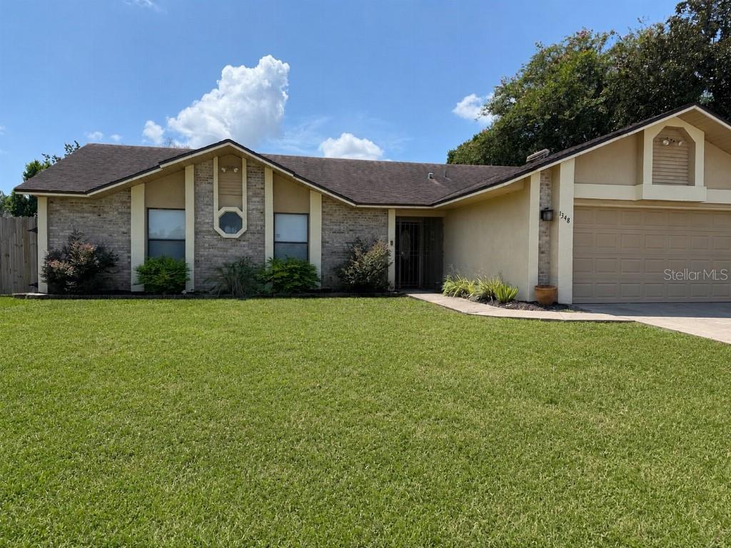 Photo of 1348 Winterville Street, Deltona, FL 32725 (MLS # TB8539286)