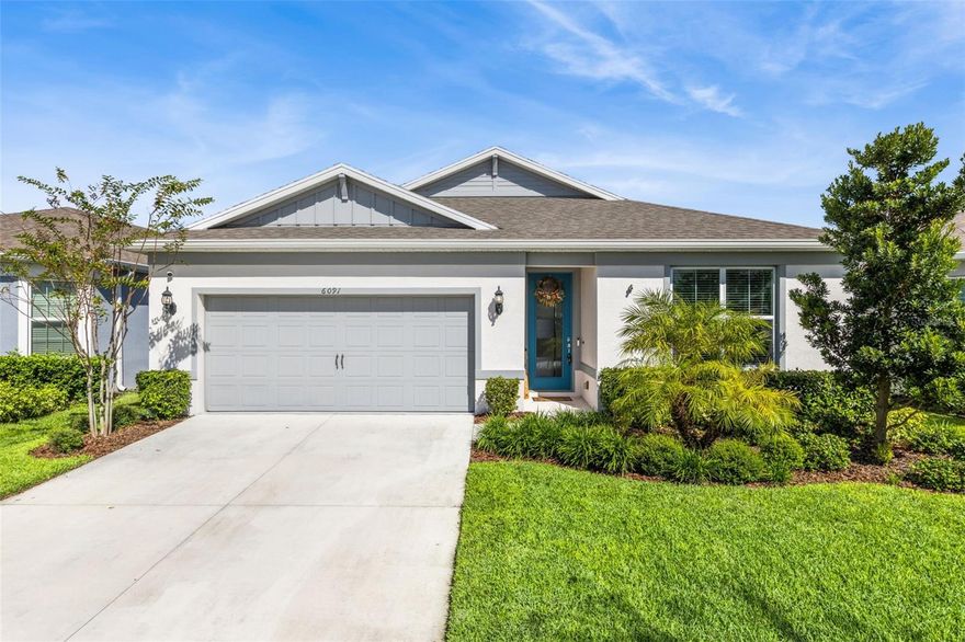 Why Wait to Build When You Can Have It All Now?
Welcome to 6091 Forest Perch, a stunning 4-bedroom, 2-bath Heston model that feels brand new—without the wait or hassle of new construction. This is the only water-view home available in the community, and it’s ready for you today.

Step inside through the elegant glass entry door and down the impressive foyer, where you’ll be greeted by an abundance of natural light and a bright, open layout. The heart of the home features a spacious kitchen, café, and gathering room that flow seamlessly together, opening onto your screened lanai with tranquil water views.

The kitchen is a showstopper with gray shaker cabinetry, Lagoon quartz countertops, stainless steel Whirlpool appliances, tile backsplash, center island, and a large walk-in pantry—perfect for the home chef.

The Owner’s Suite offers a peaceful retreat with dual quartz vanities, walk-in shower, private water closet, and large walk-in closet. The split floor plan provides privacy and convenience with the additional 3 bedrooms, shared bath and laundry tucked away for convenience and privacy.

Enjoy the best of Florida living outdoors on your screened lanai or the brick paver patio, ideal for taking in the breathtaking sunsets over the water.

Amelia Groves offers resort-style amenities including a community pool and cabana, playground, and walking trails—and no CDD fees! The neighborhood is ideally located near Downtown St. Cloud, Lake Nona, and the brand-new high school within walking distance. Outdoor enthusiasts will love being just minutes from Alligator Lake, Lake Lizzie, Waterfront Park, and the Harmony Golf Preserve.

Modern convenience comes built in with Google Nest smart home features, including thermostat, doorbell, and lighting controls and year round outdoor lights that give you control of the vibe.

Don’t wait months for new construction—experience the perfect blend of modern design, smart technology, and move-in-ready comfort at 6091 Forest Perch. Schedule your private showing today!