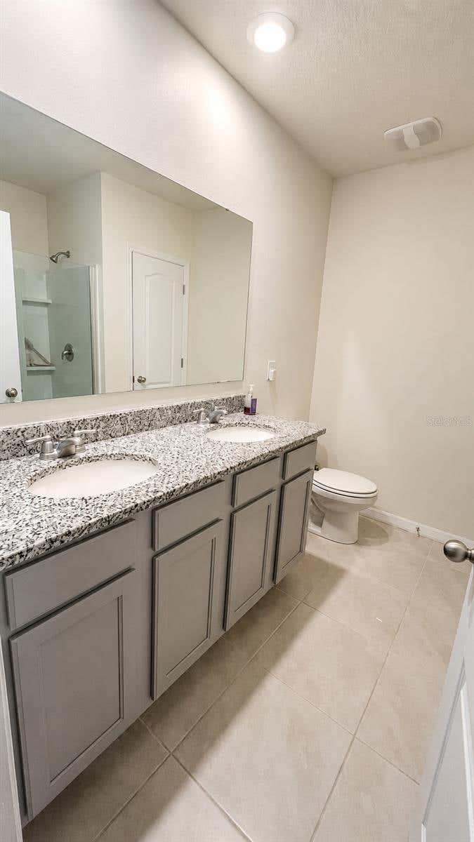 Photo of 12424 Bowes Branch Rd, Orlando, FL 32824 (MLS # S5156166)