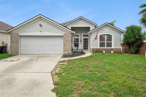 Photo of 1001 Jaybee Avenue, Davenport, FL 33897 (MLS # V4951457)