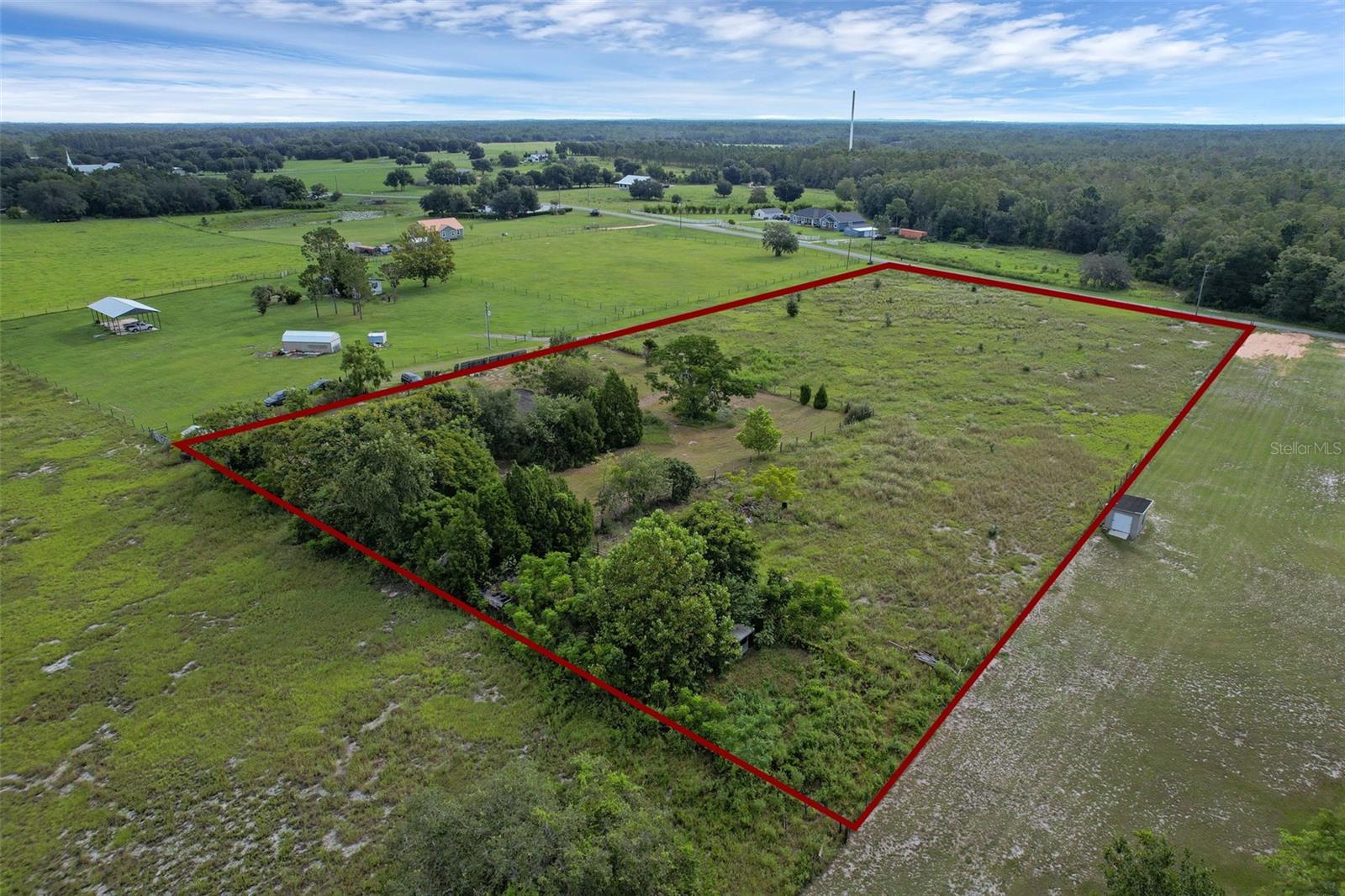 Unlock the potential of this 4.62-acre property in Groveland, offering space, privacy, and endless opportunities. The land currently features a mobile home with no value, The advantage? Utilities are already in place—including power, well, and septic—saving you time and money in the development process. With plenty of room to spread out, this property is ideal for those seeking a rural lifestyle. Whether you’re looking to build your dream home, create a private retreat, or hold land as an investment, this parcel offers flexibility and value. No HOA. Bring your ideas and start planning today!