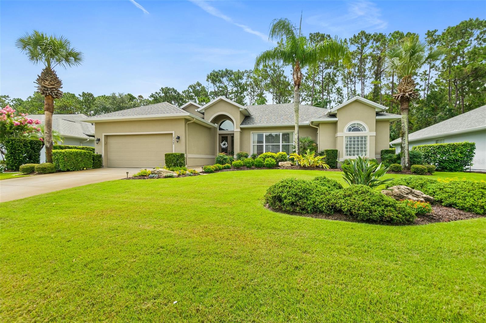 PLANTATION BAY BEAUTY-Pristine move-in ready 3BR, 2Bath home in the desirable golf club community of Plantation Bay. Walk in the front door to an entryway hallway with custom wainscoting and an inviting Living Room. High 10ft ceilings and custom crown moulding throughout the house. The chef in you will love the well-appointed Kitchen that has stainless steel appliances including a gas stove, custom made solid wood cabinets, granite countertops, walk in pantry and breakfast nook. The cozy light filled Family Room has a stacked stone gas fireplace for your slightly chilled NE Florida winter nights. The spacious Primary Bedroom has large walk-closet, tray ceiling with a fan and sliding doors to the pool deck. The large ensuite Primary Bathroom has double sinks, walk-in shower, water closet and a soaking tub. An oversized garage has a golf cart sized utility door on the side of house that leads to plenty of room for storage and or a workshop. Step out to the lanai that overlooks the peaceful and beautiful backyard gardens and relax in your private pool/spa. Property backs to preserve that is included in your nearly 1/2-acre lot. Enjoy the picturesque gardens throughout this meticulous landscaped yard. Freshly painted exterior.
The roof, gutters and pool solar panels are all 2023. Washer/Dryer convey. Original Owner!
Club Amenities that include pool, gym, social, sports and golf are available for separate membership fees.