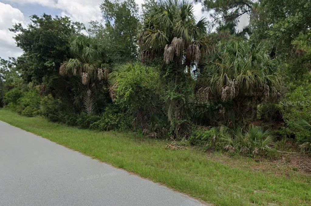 Photo of 408 Mcdill Drive, Port Charlotte, FL 33953 (MLS # D6147235)