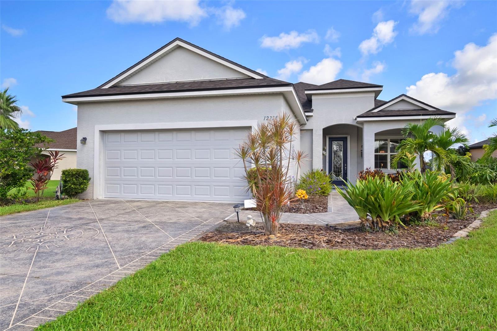 Enjoy the perfect Florida lifestyle with this open concept home. Your screened in saltwater pool overlooks a lovely serene lake. A new roof and full window hurricane protection allows you peace of mind during storms, The split bedroom floor plan gives privacy in the primary bedroom while your spa tub provides relaxation after a stressful day. This home sits on an oversized lot, and the community does allow fencing. Upgraded front door, new pool pump, new HVAC, lanai recently rescreened and an added sauna bathroom are some of the extras this home offers. Located in the highly sought after River Plantation community, avail yourself of the resort style amenities to include a pool, tennis and basketball courts, walking trails and playgrounds. NO CDD and a low HOA fee, this community is close to shopping, restaurants and major highways, not to mention top-rated schools. Conveniently located to Sarasota, Tampa and the Gulf Coast. Plenty of storage space with a two-car garage, walk-in closets and a separate laundry room. Whether you are looking for a primary or second home, this is for you! This home built in 2013 provides the ability for you to out your own personal touches and make it a place you will truly love.