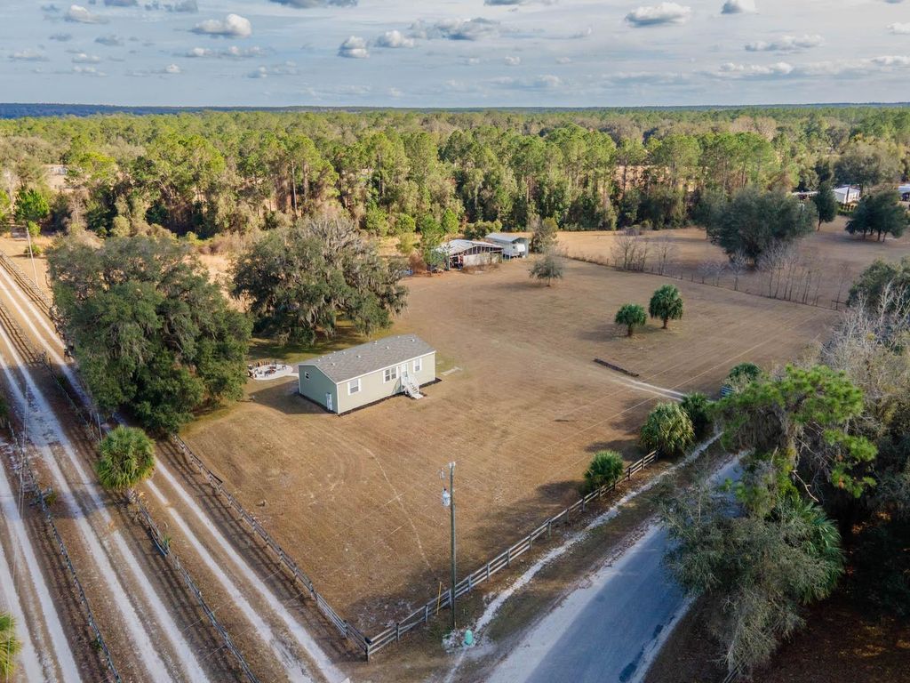 Photo of 22457 NE 130th Court Road, Fort Mccoy, FL 32134 (MLS # OM717154)