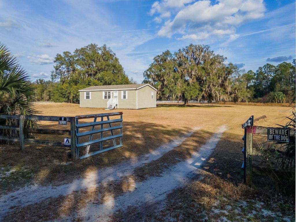Photo of 22457 NE 130th Court Road, Fort Mccoy, FL 32134 (MLS # OM717154)