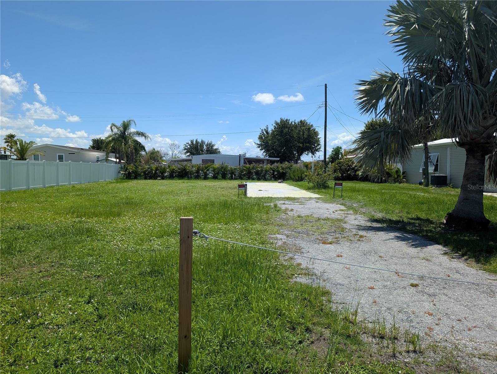 Mobile Home lot in the boating community of Mobile Estates! Within steps of the community boat ramp with GULF access. First-come, first-served docks and boat slips with optional HOA. 56X12 slab already in place. Water is ready and available. Power pole will need to be added by FPL. Located in Englewood just blocks from 776. Restaurants and shopping nearby. Take a short drive to beaches, Boca Grande, world-class fishing, numerous golf courses and TWO Major League Baseball Spring Training stadiums! Join the optional HOA at Mobile Estates to have access to the clubhouse, activities, shuffleboard courts and more.