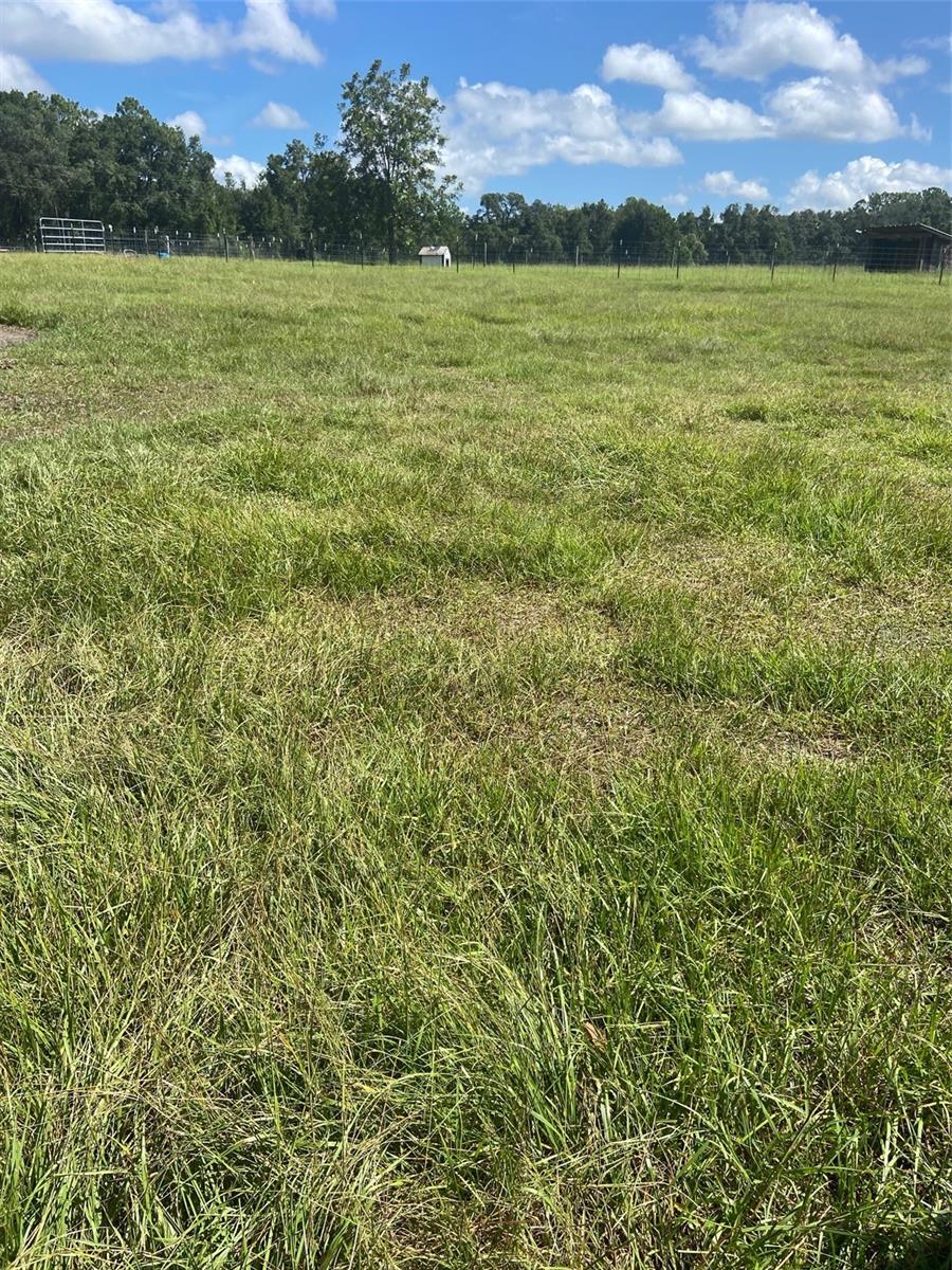 Here is an incredible opportunity to own a unique 5.81 acres that backs up into beautiful lake Lake Bowers.You can build your private boat ramp and access the lake from your own property like every one else in that area. That property is zoned Residential Estate where you can build your dream home and have your horses too. This rural area is very peaceful and quiet with no congestion or heavy traffic. There is only one road in and out to this entire area of Bowers Lake Estates. Property is completely fenced. No H.O.A. Animals and equipment do not convey.