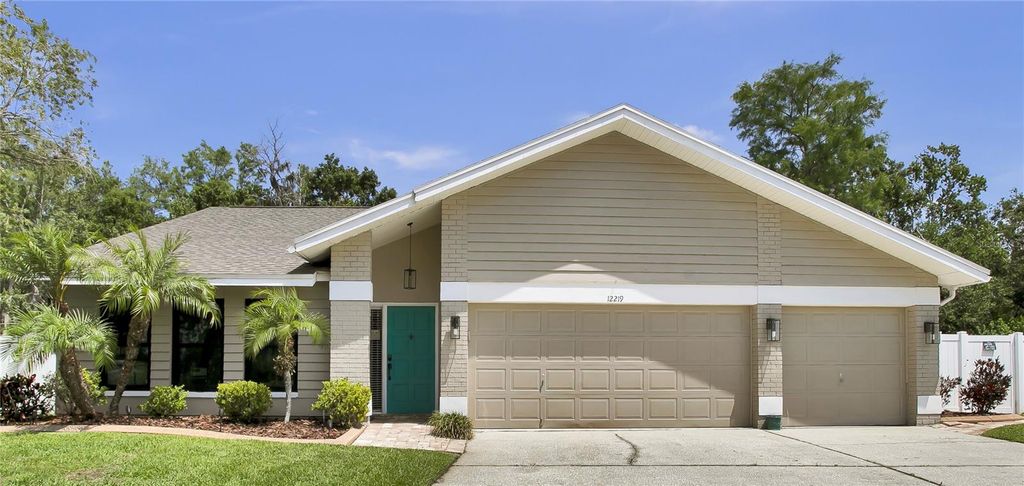 Photo of 12219 Steppingstone Boulevard, Tampa, FL 33635 (MLS # TB8393386)