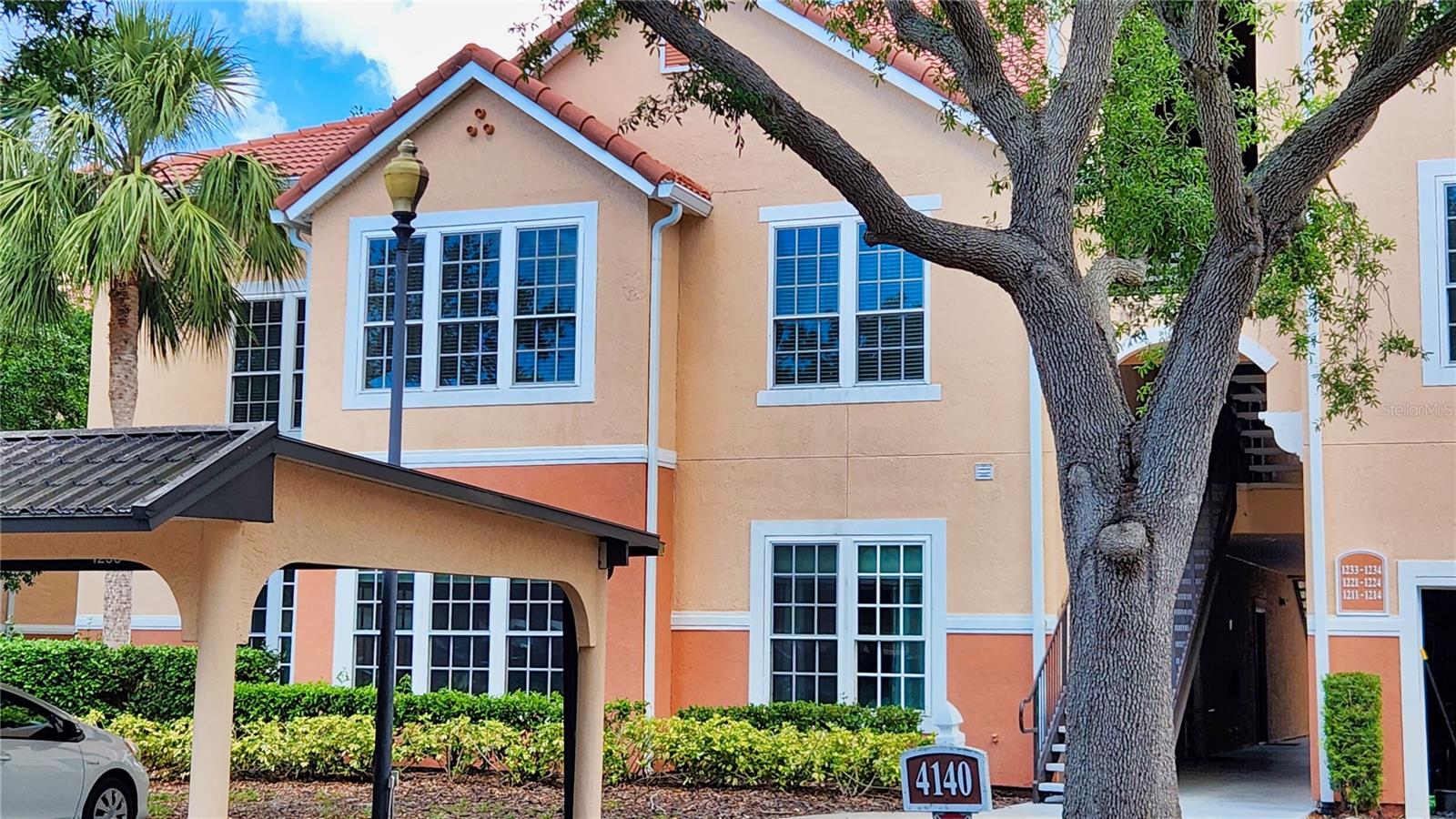 GREAT VALUE and COASTAL LOCATION CLOSE TO THE TOP-RATED U.S. BEACH ON SIESTA KEY! This is a spacious, clean and bright 3-bedroom, 2-bath condominium home conveniently located on the end of the building on the top floor (2nd floor) with vaulted ceilings and privacy. The unit is behind the resort-style clubhouse and large pond, with a sidewalk to the heated pool, spa, picnic area and large fitness center. It has a 1400 square foot open concept floor plan, luxury wood laminate in living areas, upgraded light fixtures and fans, 9-foot ceilings, a large kitchen with breakfast bar and lots of cabinet space, a light and bright solarium (an extension to the living room) with five thermal, impact-resistant windows, bedrooms with large walk-in closets and a separate laundry room just off the foyer entry with some room for added storage. The unit includes a lighted carport in front of the unit. The condo is in the quiet, gated community named “Bella Villino Condominiums” which is located in the award-winning, master-planned development of “Palmer Ranch” in south Sarasota. The community boasts superb amenities not available at comparable properties in this price range and features an elegant clubhouse with a resort-style heated pool and spa, a large fitness center with state-of-the-art equipment including cardio machines, indoor racquetball and basketball, a billiards room, and a business center. The community has a tennis court, pickle-ball courts, a car detail area, gas grills with picnic areas, pet stations located around the property, an onsite property manager, and maintenance staff. It is close to world-class beaches, marinas, the popular Legacy Trail (bicycle, jog, or walk), shopping centers with a Costco, Target, Publix, Walgreens, CVS, various banks, restaurants, golf courses, art centers, museums, and so much more. Unfurnished 12 month lease.