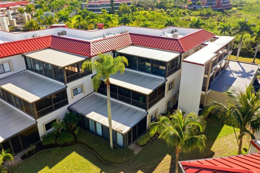 SOUTHSHORE at Burnt Store Marina is a hidden gem offering double gated security and an exceptional array of amenities. This fabulous 2-bedroom, 2-bath condo features beautiful marina views and an oversized garage conveniently located just steps from the stairway or accessible by elevator. The lanai has been seamlessly incorporated into the living area with elegant new porcelain tile, creating a spacious open floor plan with a comfortable, cozy atmosphere perfect for entertaining guests. The vibrant kitchen is well appointed with upgraded appliances, including two ovens—a lower convection oven and an upper multifunction oven with a special grill—along with a wine cooler and country sink, while a striking LED fixture casts a prism of light, complemented by an antique light and festive artwork on the breakfast bar. The primary bath is a luxurious retreat with a raised ceiling and an Ariel bath unit featuring a jetted tub, foot massage, back jets, steam shower, rain shower head, and dual handheld shower heads. The spacious second bedroom offers a large walk-in closet, with additional storage in both the foyer and second bedroom. A full-size washer and dryer and select furnishings are included. Enjoy true Florida living—walk to Cass Cay Restaurant or the Trading Post deli, fish, golf, bike, swim in the marina’s large pool, play cards in the clubhouse, or simply relax and do nothing at all—once you visit, you’ll want to stay and become part of the Southshore Neighborhood Community.