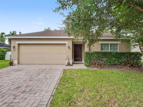 Photo of 1407 Marsh Meadow Ln, Davenport, FL 33896 (MLS # O6425866)
