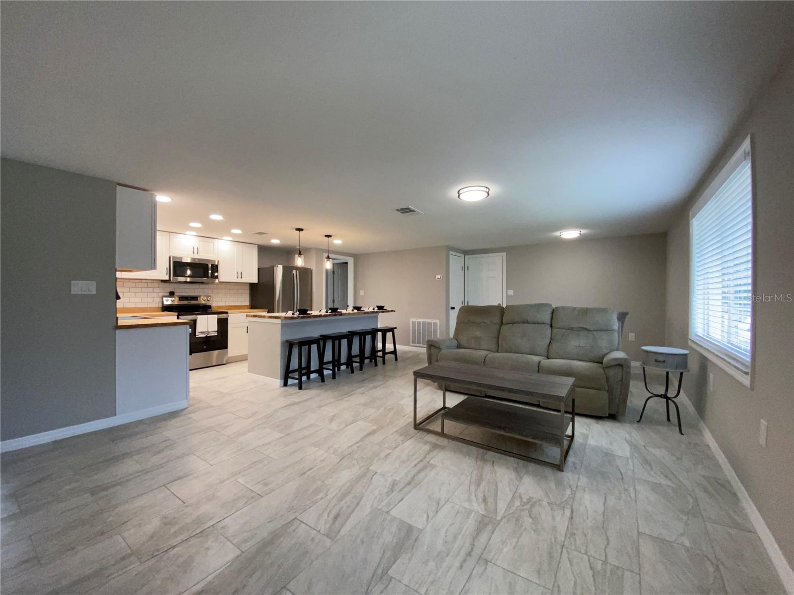 12907 COLLEGE HILL DRIVE