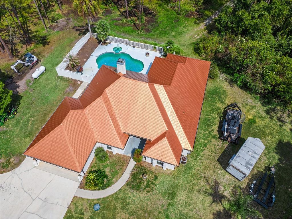 Photo of 225 Limpkin Lane, Frostproof, FL 33843 (MLS # O6403059)
