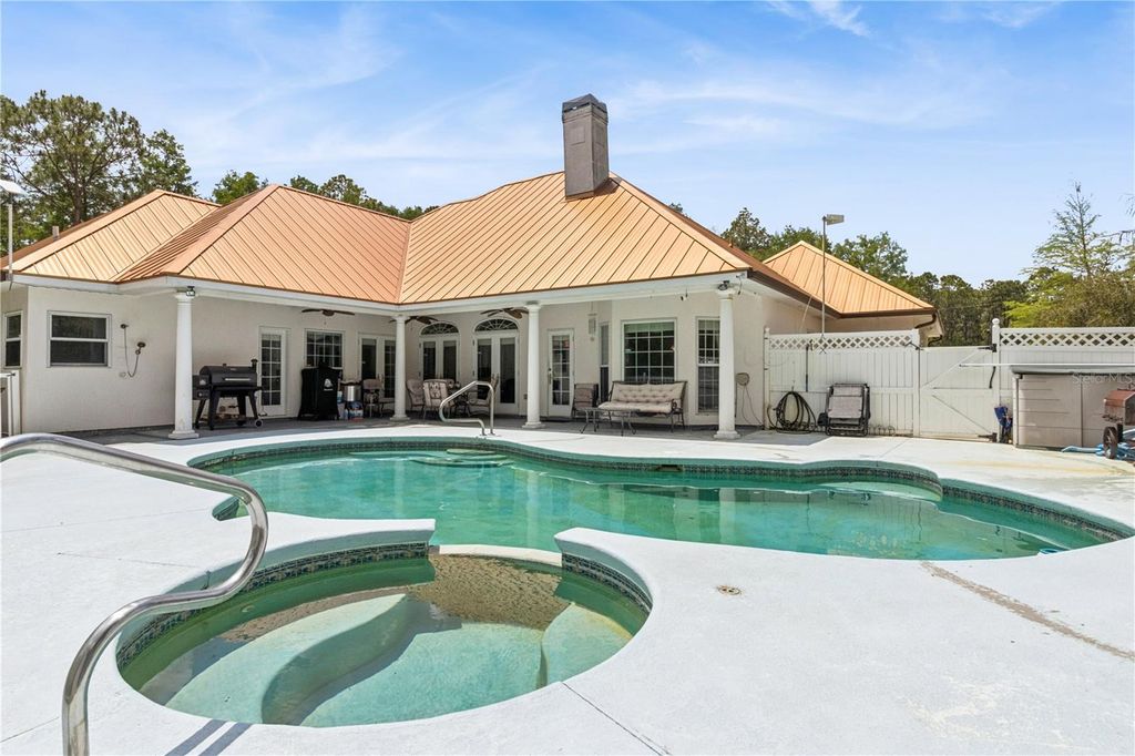 Photo of 225 Limpkin Lane, Frostproof, FL 33843 (MLS # O6403059)