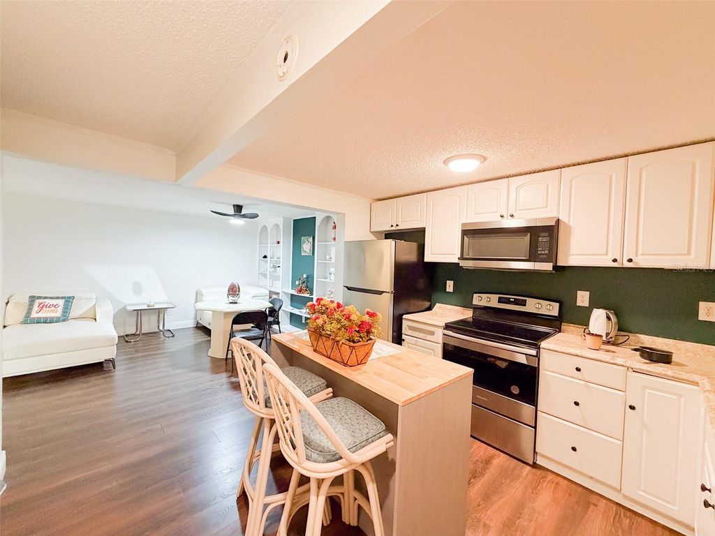 Photo of 4219 E Michigan Street #4219, Orlando, FL 32812 (MLS # O6372918)