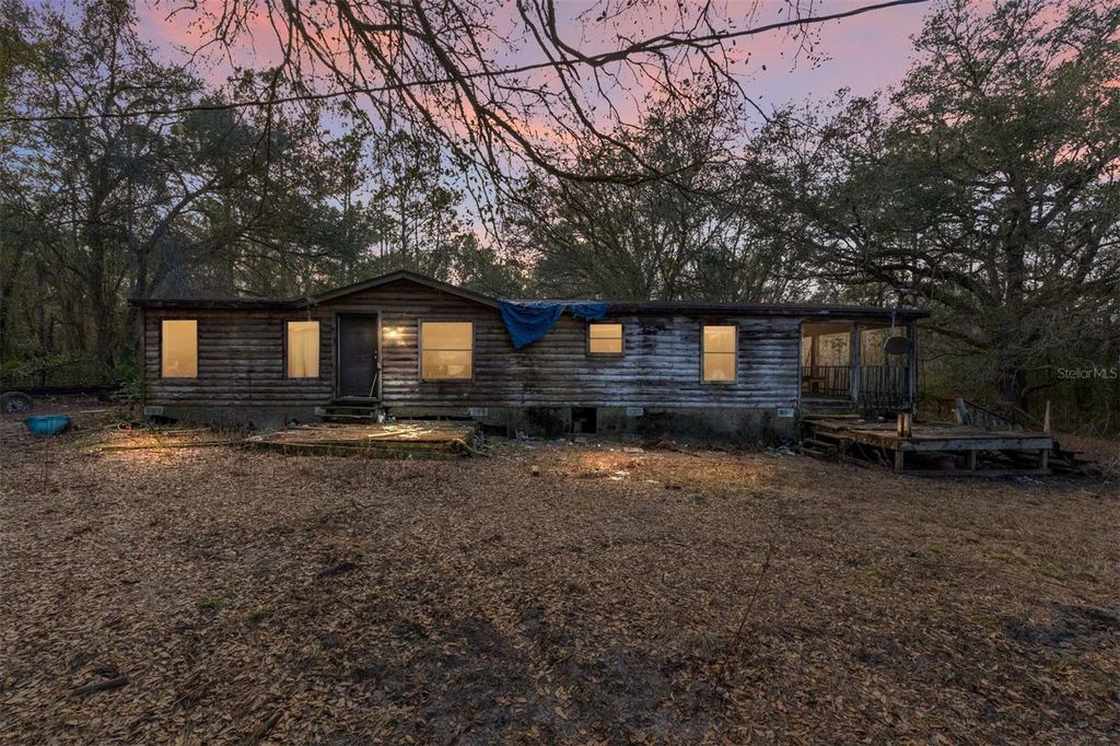 Photo of 12264 NE 139th Place, Fort Mccoy, FL 32134 (MLS # G5107279)