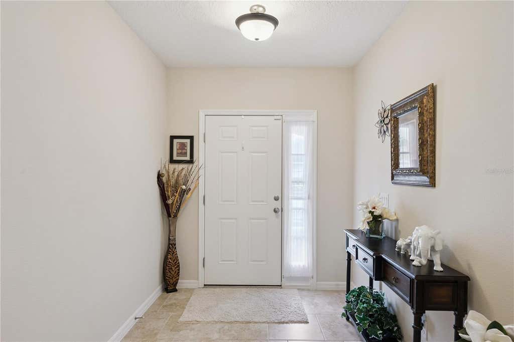 Photo of 518 Cadiz Loop, Davenport, FL 33837 (MLS # O6431343)