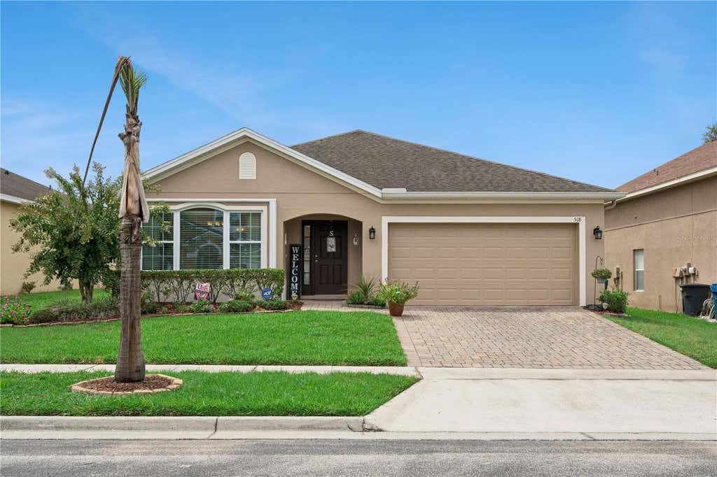 Photo of 518 Cadiz Loop, Davenport, FL 33837 (MLS # O6431343)