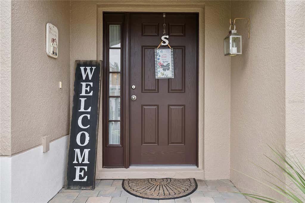 Photo of 518 Cadiz Loop, Davenport, FL 33837 (MLS # O6431343)